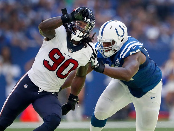 Houston Texans linebacker Jadeveon Clowney (90) gace Indianapolis Colts offensive tackle Le'Raven Clark (62) all he could handle chasing down Andrew Luck in the first half of their game on Sunday, Sept. 30, 2018. 