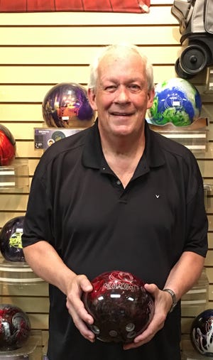 Bill Funk poses in the pro shop in Mesquite.