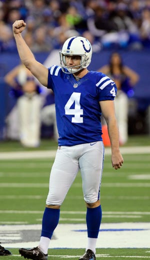 Indianapolis Colts kicker Adam Vinatieri (4) reacts after making a field goal in the fourth quarter against the Houston Texans at Lucas Oil Stadium.