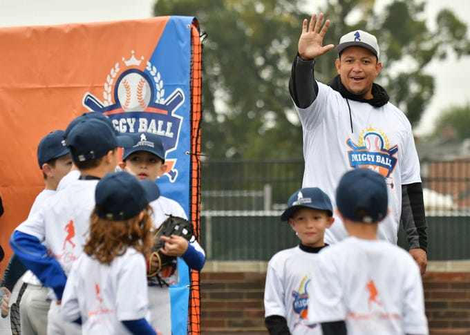 Tigers' Miguel Cabrera greets the kids at the Miggy Ball 24 event.