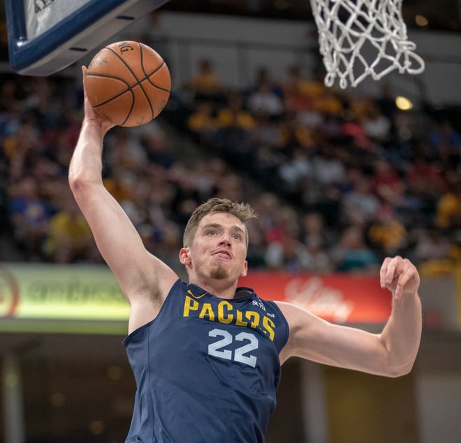 TJ Leaf puts down a dunk during the Pacers FanJam to kick off the 2018-2019 season, Sunday, Sept. 30, 2018. A scrimmage was played, along with a photo session with players, a three-point contest, and performances by the Pacers Power Pack gymnasts, and Pacemates dance team. 