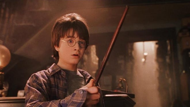 They grow up so fast: Not unlike a symphony conductor, Daniel Radcliffe waves a wand and creates magic in "Harry Potter and the Sorcerer's Stone," which screens Saturday and Sunday at the Orpheum with live accompaniment from the Memphis Symphony Orchestra.