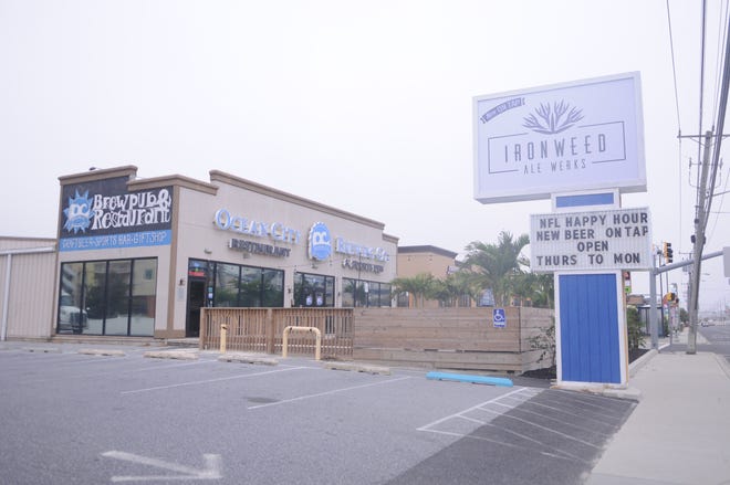 A sign outside Ocean City Brewing Company reads, "Ironweed Ale Werks," suggesting the business will be under new ownership.