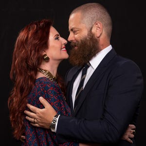 Actors Megan Mullally and Nick Offerman get close in New York on Oct. 1, 2018. The couple have written a funny book about their marriage and lives.