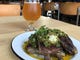 Crispy lamb ribs with chimichurri and pickled jalapenos rest on a bed of cucumber yogurt sauce, a spicy dish begging the refreshing kolsch with character at Field Brewing, 303 E. Main St., Westfield. The family-friendly brewery and restaurant opened Oct. 1, 2018.