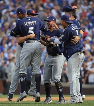 CHICAGO, IL - OCTOBER 01:  Members of the Milwaukee brewers celebrate after beating the Chicago Cubs in the National League Tiebreaker Game at Wrigley Field on October 1, 2018 in Chicago, Illinois. The Brewers defeated the Cubs 3-1 to win the Central Division.  (Photo by Jonathan Daniel/Getty Images)