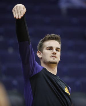 Suns' Dragan Bender warms up before a game against the Kings at Talking Stick Resort Arena in Phoenix, Ariz. on October 1, 2018.