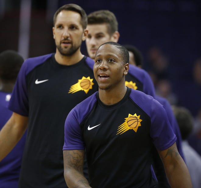 Suns Isaiah Canaan warms up before a game against the Kings at Talking Stick Resort Arena in Phoenix, Ariz. on October 1, 2018.