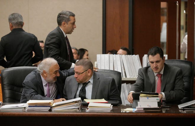 Attorney Joe Spencer shares a moment with his client Daniel Villegas before opening statements were delivered in the opening day of Villegas’ third trial. Villegas is charged with Capital Murder in connection in the 1993 deaths of Armando "Mando" Lazo and Bobby England. Villegas, who was 16 years old at the time, was allegedly a member of a street gang that shot at four teens, fatally striking Lazo and England on April 10, 1993.