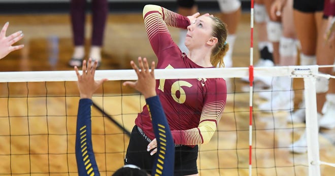 Elon's Kam Terry, a Highland grad, raised up for a hit against NC A&T in women's non-conference volleyball action at Schar Center earlier this season in Elon, North Carolina.