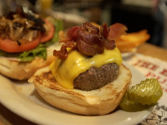 The Blazer Burger at the Blazer Pub is topped with bacon, cheese and carmelized onions.