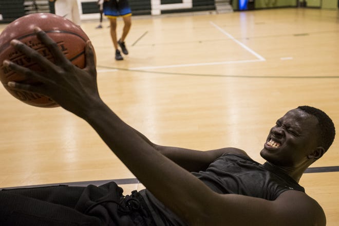 Chol Marial works out on Wednesday, Sept. 19, 2018, at AZ Compass Prep in Chandler, Ariz.