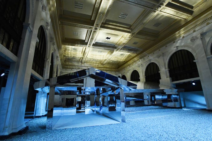 Los Angeles artist Doug Aitken and his "Mirage Detroit" project in the old People's State Bank.