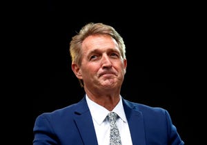 Sen. Jeff Flake, R-Ariz., listens to a question during an appearance at the Forbes 30 Under 30 Summit, Monday, Oct. 1, 2018, in Boston.