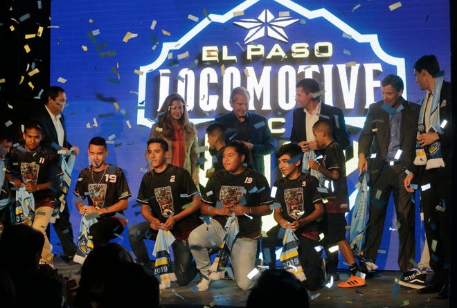 Officials from the MountainStar Sports Group stand on stage at the EPIC Railyard Event Center as the official name of El Paso’s USL team was announced. The name chosen from the final five was El Paso Locomotive FC.