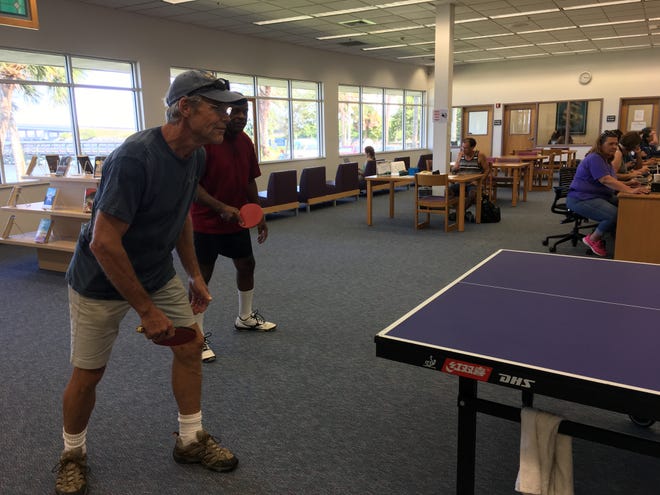 Space Coast Table Tennis club members gave an exhibition and lessons at the Eau Gallie library Saturday.