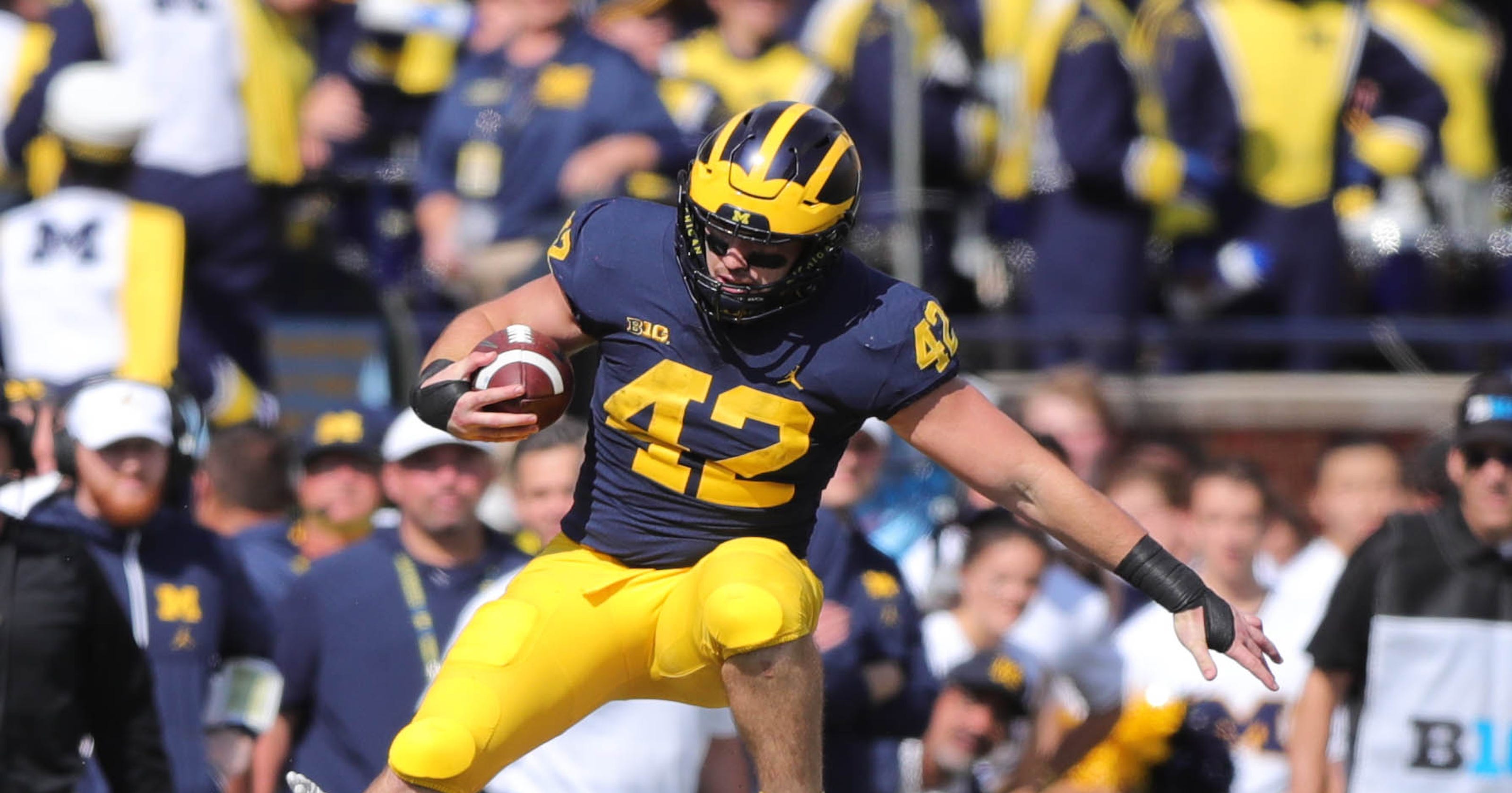 Michigan's Ben Mason hurdles his way into the highlights