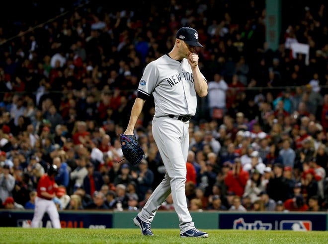 New York Yankees starting pitcher J.A. Happ leaves during the third inning against the Boston Red Sox in Game 1 of a baseball American League Division Series on Friday, Oct. 5, 2018, in Boston.