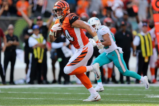 Cincinnati Bengals defensive end Sam Hubbard (94) returns returns an interception for a touchdown in the fourth quarter during the Week 5 NFL game between the Miami Dolphins and the Cincinnati Bengals, Sunday, Oct. 7, 2018, at Paul Brown Stadium in Cincinnati. Cincinnati 27-17. 