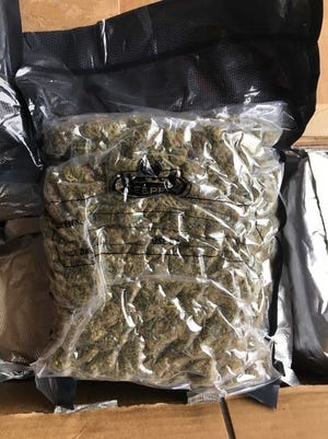 More than 60 pounds of marijuana were found after police searched the home of Eddie Baker Jr.