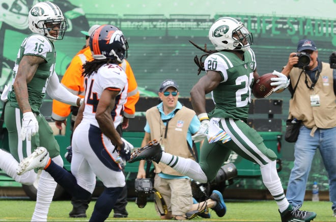 Isaiah Crowell, of the Jets, runs most of the field for a touchdown in the first half.   Sunday, October 7, 2018