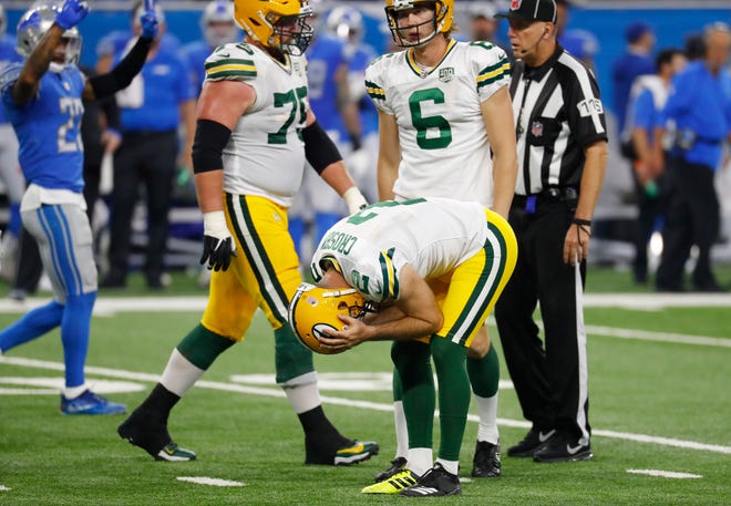 Green Bay Packers kicker Mason Crosby reacts after missing his third field goal of the day during the first half of an NFL football game against the Detroit Lions, Sunday, Oct. 7, 2018, in Detroit.