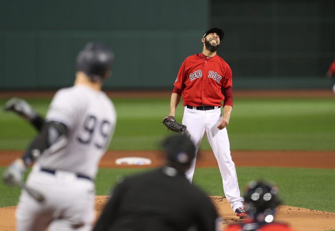 Red Sox starting pitcher David Price reacts after Yankees right fielder Aaron Judge hits a solo home run in the first inning.