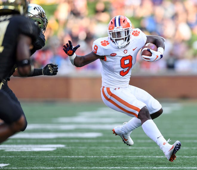 Clemson running back Travis Etienne (9) is moving into the Heisman Trophy picture with his play this season.