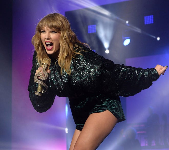 Taylor Swift performs on Dec. 10, 2017 in London. On Saturday, Swift met with superfan Joey Grundl, from Waldo, after her concert in Dallas. Grundl, a pizza delivery driver, helped rescue a kidnapped woman last Thursday, and was seen wearing a Taylor Swift hoodie during TV news interviews about the incident.