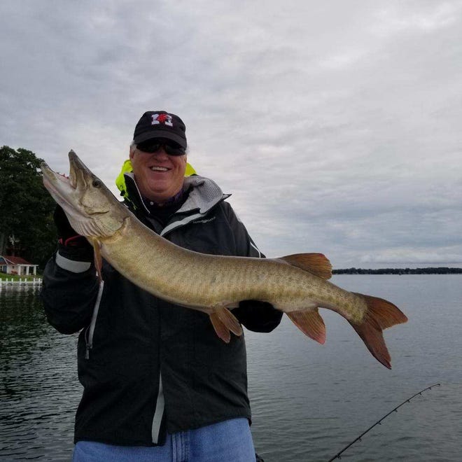 Bill Stubblefield caught a 43-inch muskie on Pewaukee Lake. He traveled from Indiana with friends to honor Mark Bolan, an avid fisherman who died in a traffic accident in 2014.