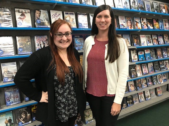 Store manager Shivonna Matthews and Family Video district manager Beth Kerry in the Livonia store.