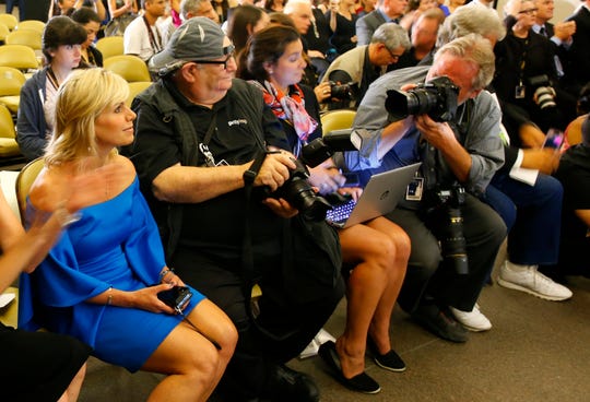 Gretchen Carlson, chair of the board of Miss America, left, sits in the audience at the Miss America news conference, Sept. 9, 2018, in Atlantic City, N.J.