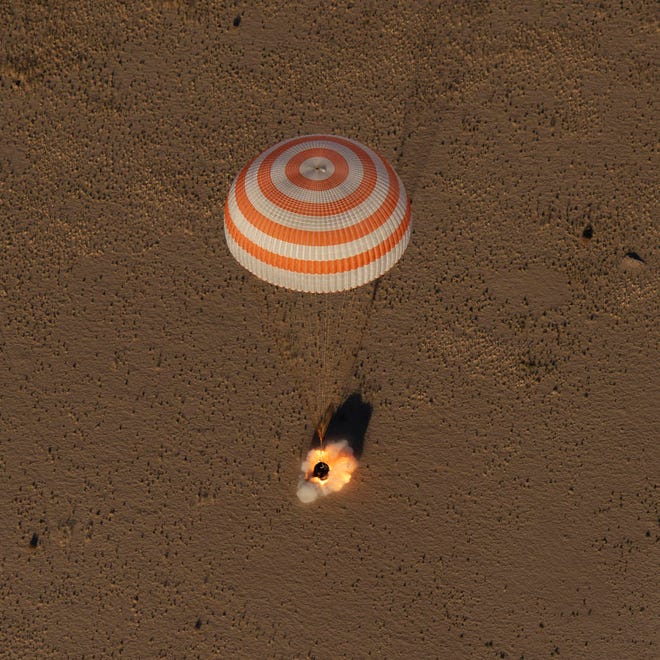 The Soyuz MS-08 spacecraft is seen as it lands with Expedition 56 Commander Drew Feustel and Flight Engineer Ricky Arnold of NASA, along with Flight Engineer and Soyuz Commander Oleg Artemyev of Roscosmos near the town of Zhezkazgan, Kazakhstan on Thursday, Oct. 4, 2018.