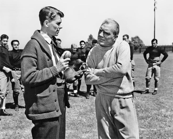 George Gipp (Ronald Reagan, left) is the star halfback for Notre Dame coach Knute Rockne (Pat O’Brien) in 1940's "Knute Rockne, All American."