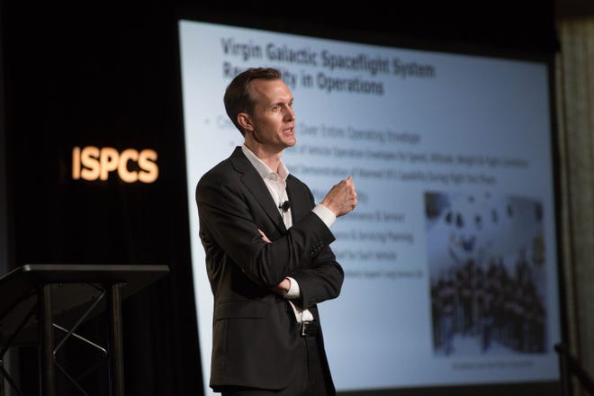 George Whitesides, CEO of Virgin Galactic, speaks to the International Symposium for Personal and Commercial Spaceflight at the New Mexico Farm and Ranch Museum, Wednesday October 10, 2018.