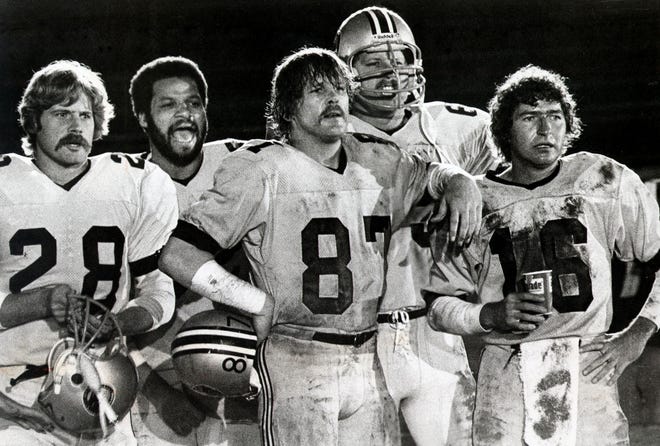 Nick Nolte (center) is a wide receiver who leads a hard-living football squad in "North Dallas Forty."