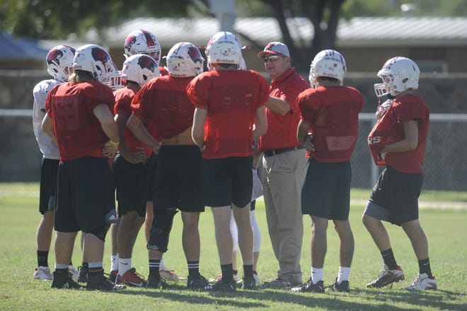 First-year Baird coach Joel Baker delivers instructions to his team during practice Oct. 10, 2018. The Bears will look to continue their hot start Friday as district play starts.