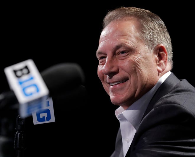 Michigan State coach Tom Izzo smiles as he speaks at a news conference during Big Ten basketball media day on Thursday, Oct. 11, 2018, in Rosemont, Ill.