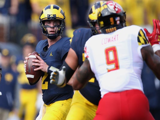 Michigan Qb Patterson Presents Challenge To Uw Defense
