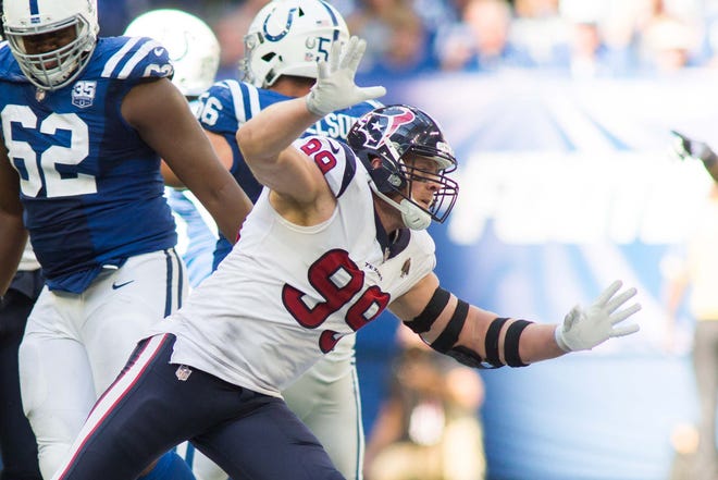 Houston Texans defensive end J.J. Watt (99) rushes the quarterback in the second half against the Indianapolis Colts at Lucas Oil Stadium.