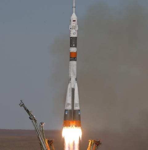 Soyuz booster rocket with the Soyuz MS-10...