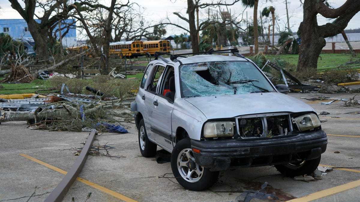 A debris-damaged SUV sits in a parking lot at Panama City following the passage of Hurricane Michael.  Oct. 11, 2018; Denver, CO USA; xxx Mandatory credit: Trevor Hughes-USA TODAY NETWORK (Via OlyDrop)