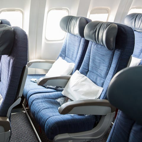 Americans are getting larger and airline seats...