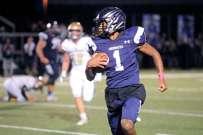 St. Augustine’s Justin Shorter runs for a gain against visiting Holy Spirit on Friday, October 12, 2018.