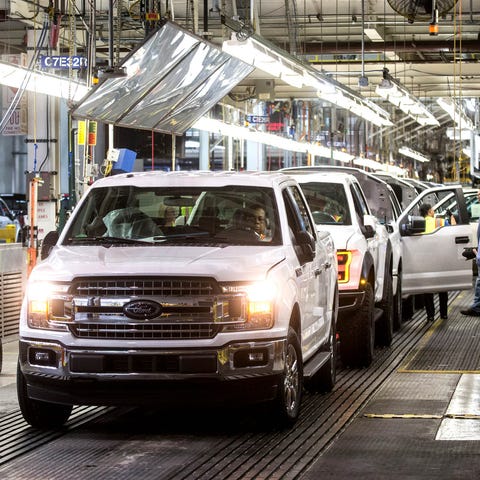 Ford F-150 trucks come off the assembly line at th