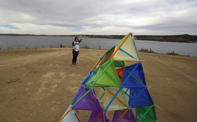 Mykah Garcia flies a kite at Farmington Lake in a file photo from March 2017. The City Council is considering spending $150,000 on wayfaring signs that would direct tourists to local attractions.