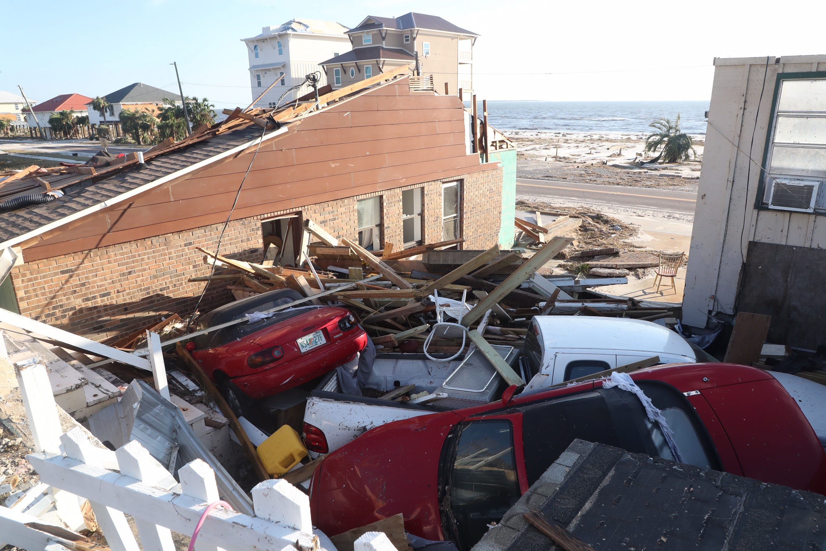 Damaged homes and cars in Beacon Hill, Fla. — just south of Mexico City where Hurricane Michael made landfall.