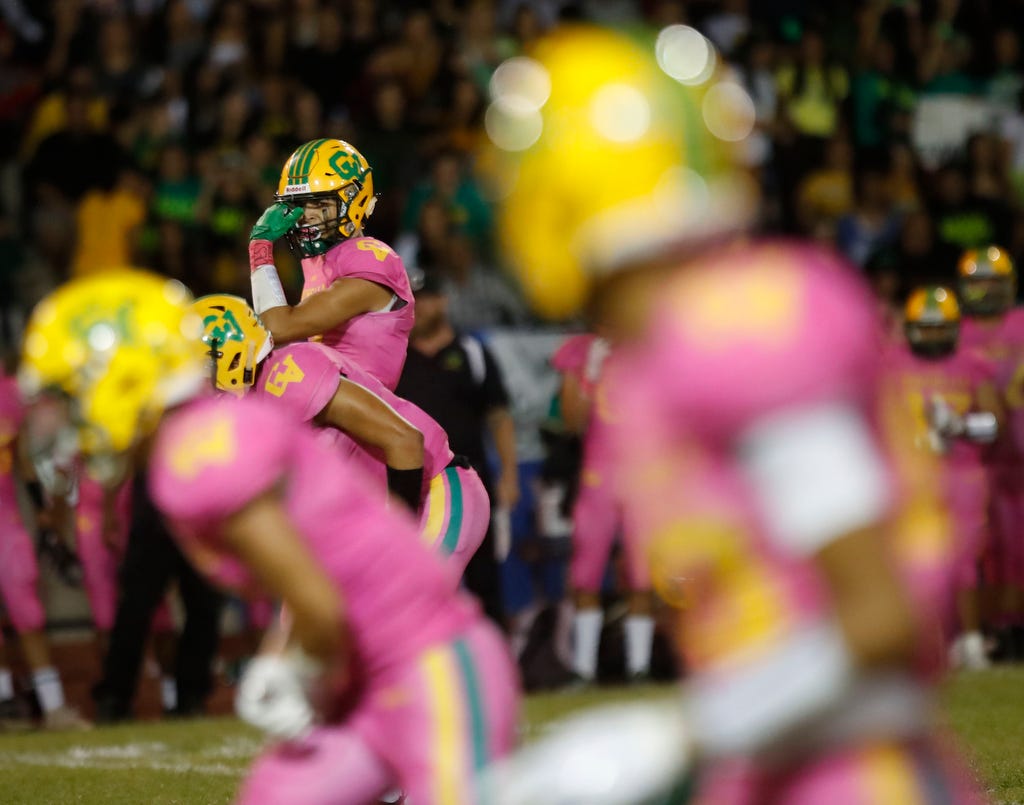 pink football uniforms