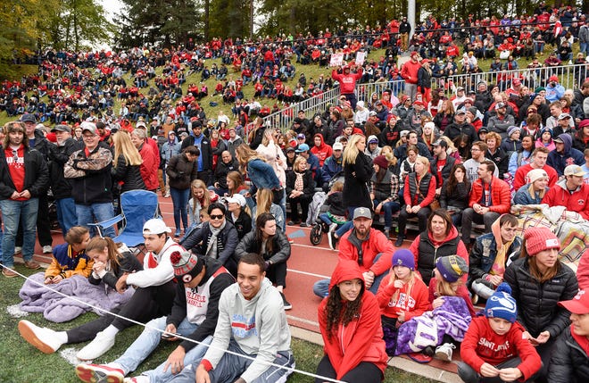 Fans find a place to watch the St. John's and St. Thomas football Oct. 2018, in Collegeville.