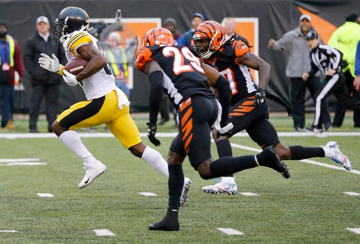 Pittsburgh Steelers wide receiver Antonio Brown (84) outruns the Bengals secondary for a game-winning touchdown in the fourth quarter of the NFL Week 6 game between the Cincinnati Bengals and the Pittsburgh Steelers at Paul Brown Stadium in downtown Cincinnati on Sunday, Oct. 14, 2018. The Bengals and Steelers exchanged late touchdowns, with the Pittsburgh coming out on top, 28-21.